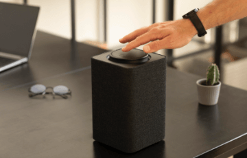 man-using-smart-speaker